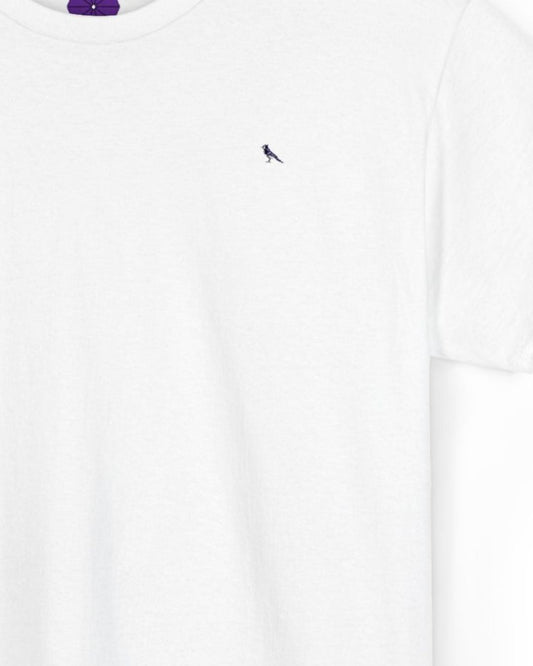 White t-shirt with a small blue bird embroidered on a white background