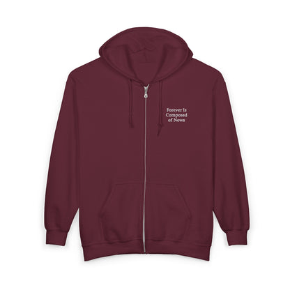 Maroon Emily Dickinson zip-up hoodie with "Forever is Composed of Nows" embroidered in white on the left chest