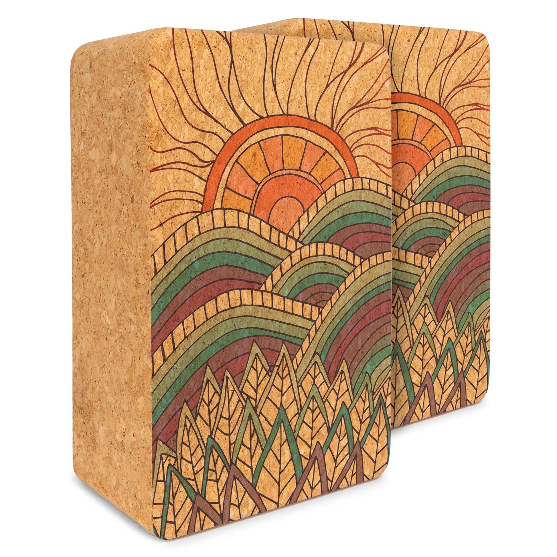 Cork yoga block with a colorful mountain and sun design on a white background