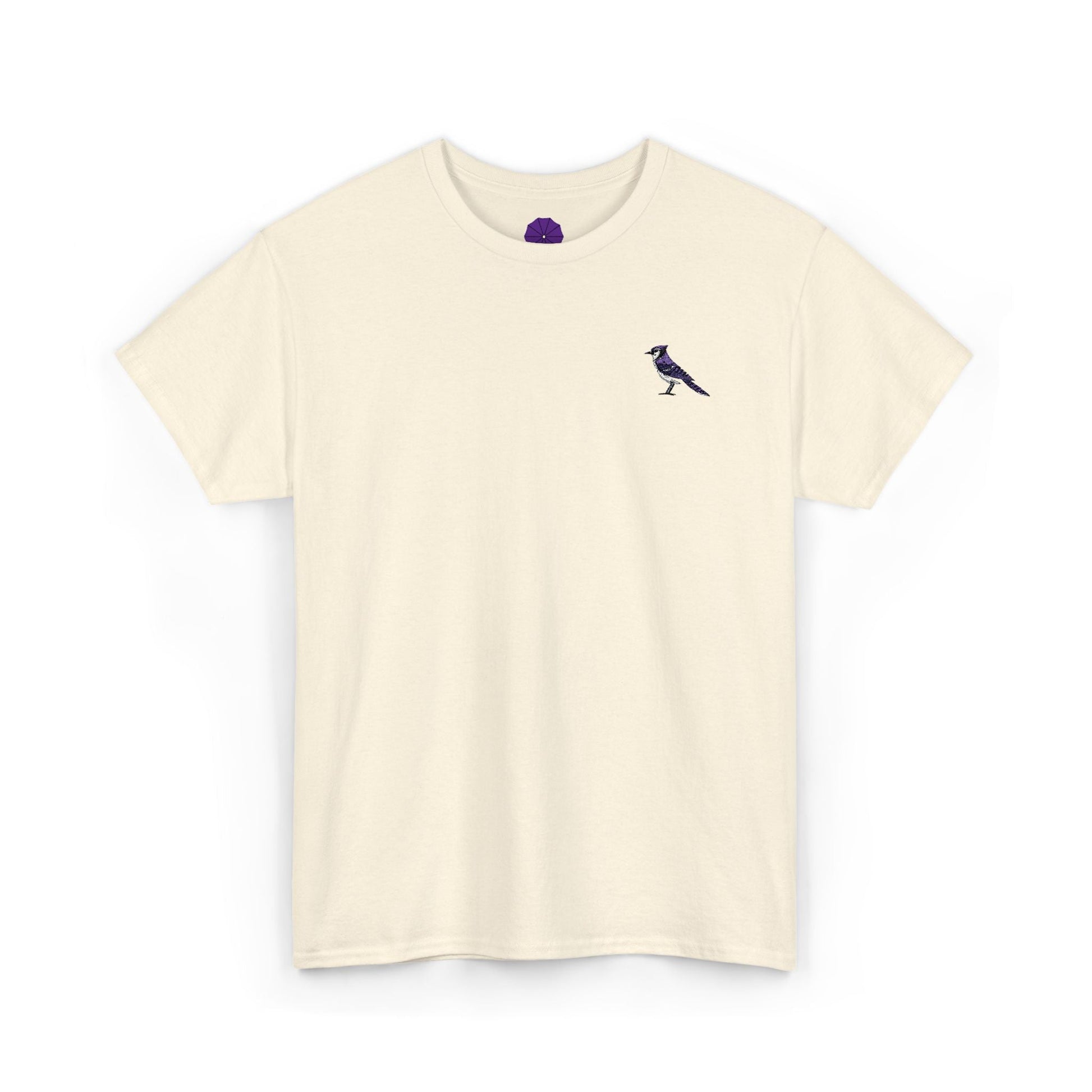 Beige t-shirt with a small bluebird design on a natural colored t-shirt
