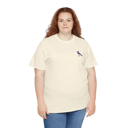 Person wearing a beige t-shirt with a small graphic on a white background