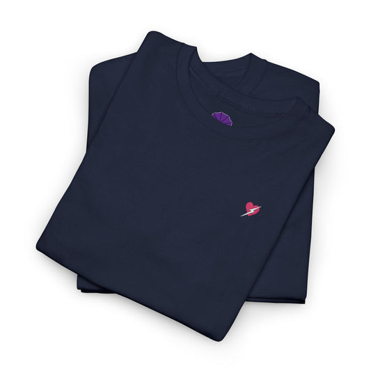 Folded navy blue shirt with small embroidered designs on a white background