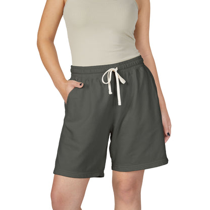 Person wearing pepper shorts with a white drawstring on a white background