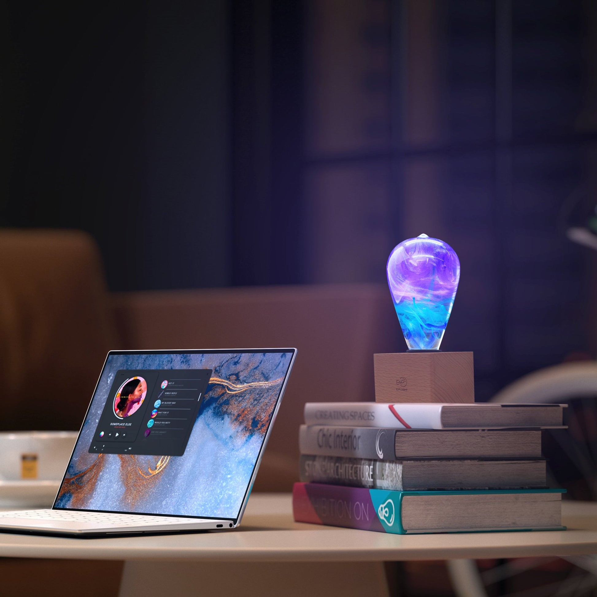 Resin bulb plugged in on desk on stack of books next lamp top