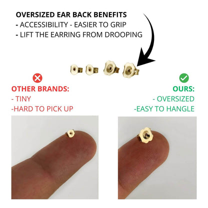 Oversized gold earring back compared with a tiny standard back, shown on a fingertip