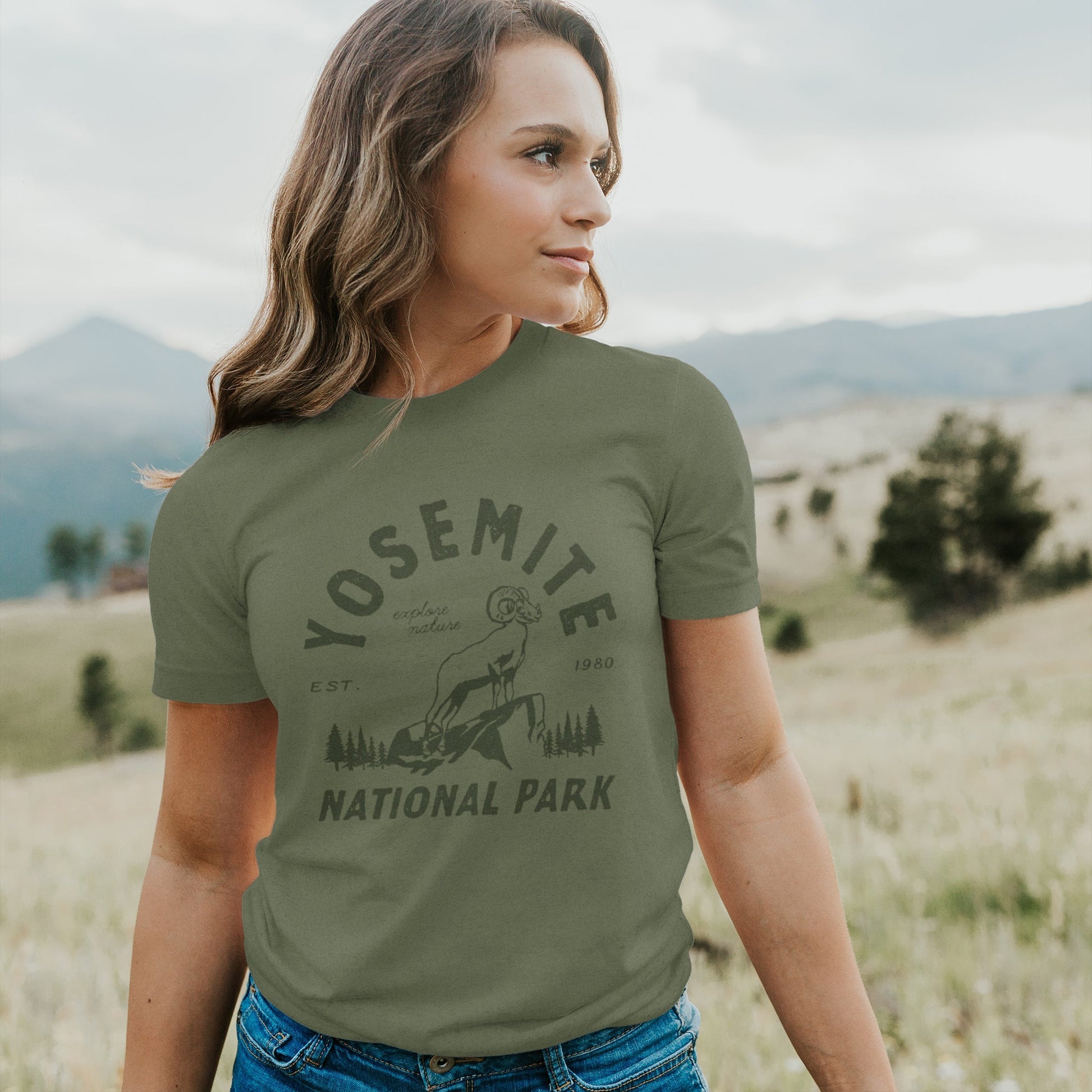 Woman in green yosemite national park tee